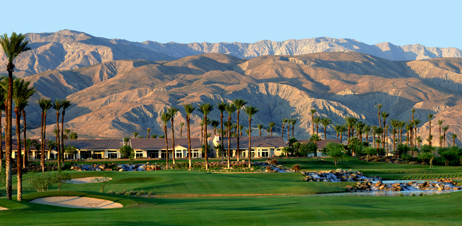 golf course green with mountains